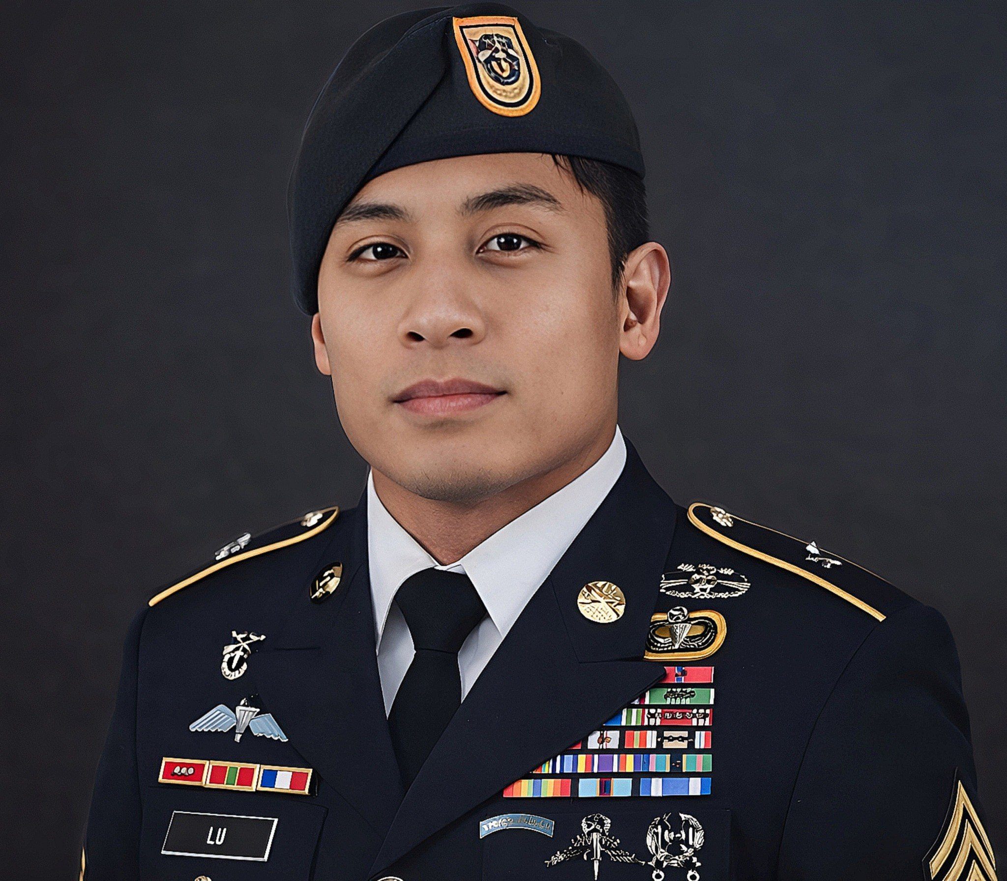Jonathan Lu wearing his Army dress uniform and beret